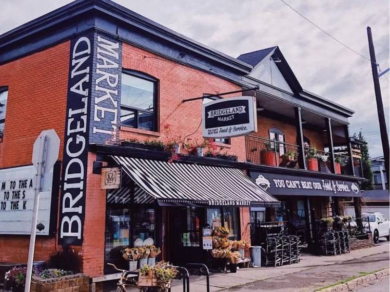 Bridgeland Market and local shops along 1 Ave NE in Calgary