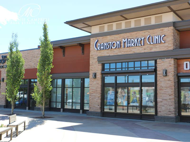 Cranston Market in Calgary with modern brick exterior and storefront windows
